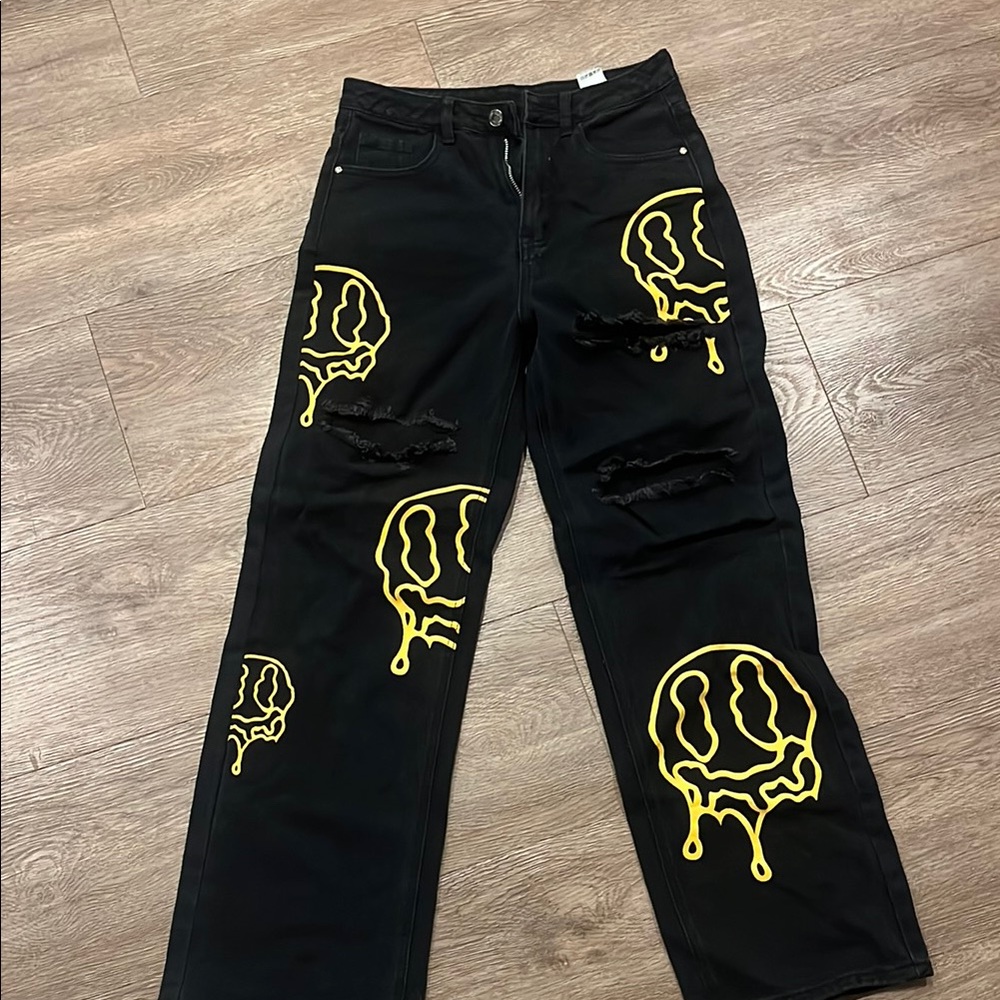 Black Jeans with Yellow Dripping Smiley Faces